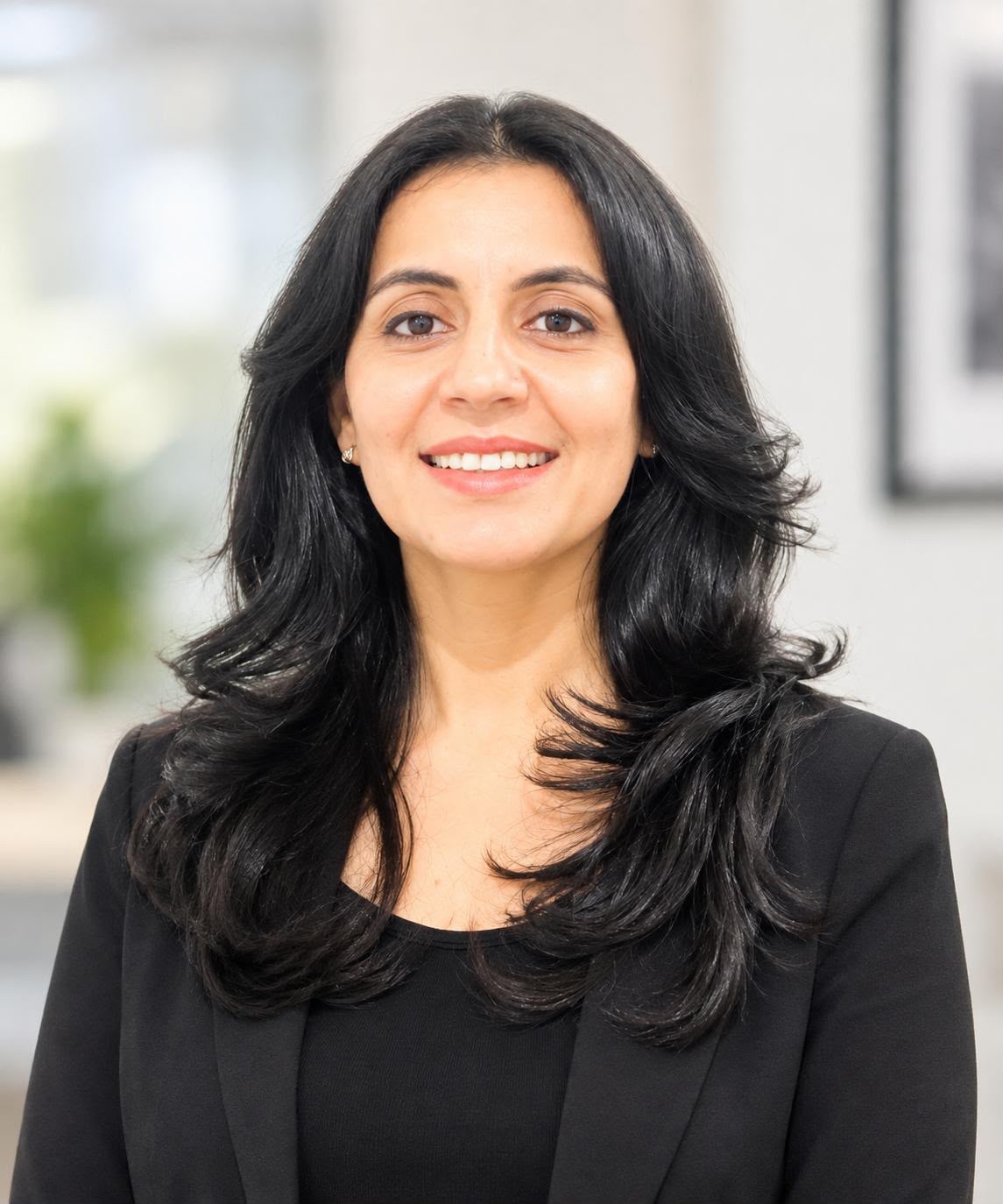 Portrait of Dr Simran Chauhan, dentist at Supertooth Dental