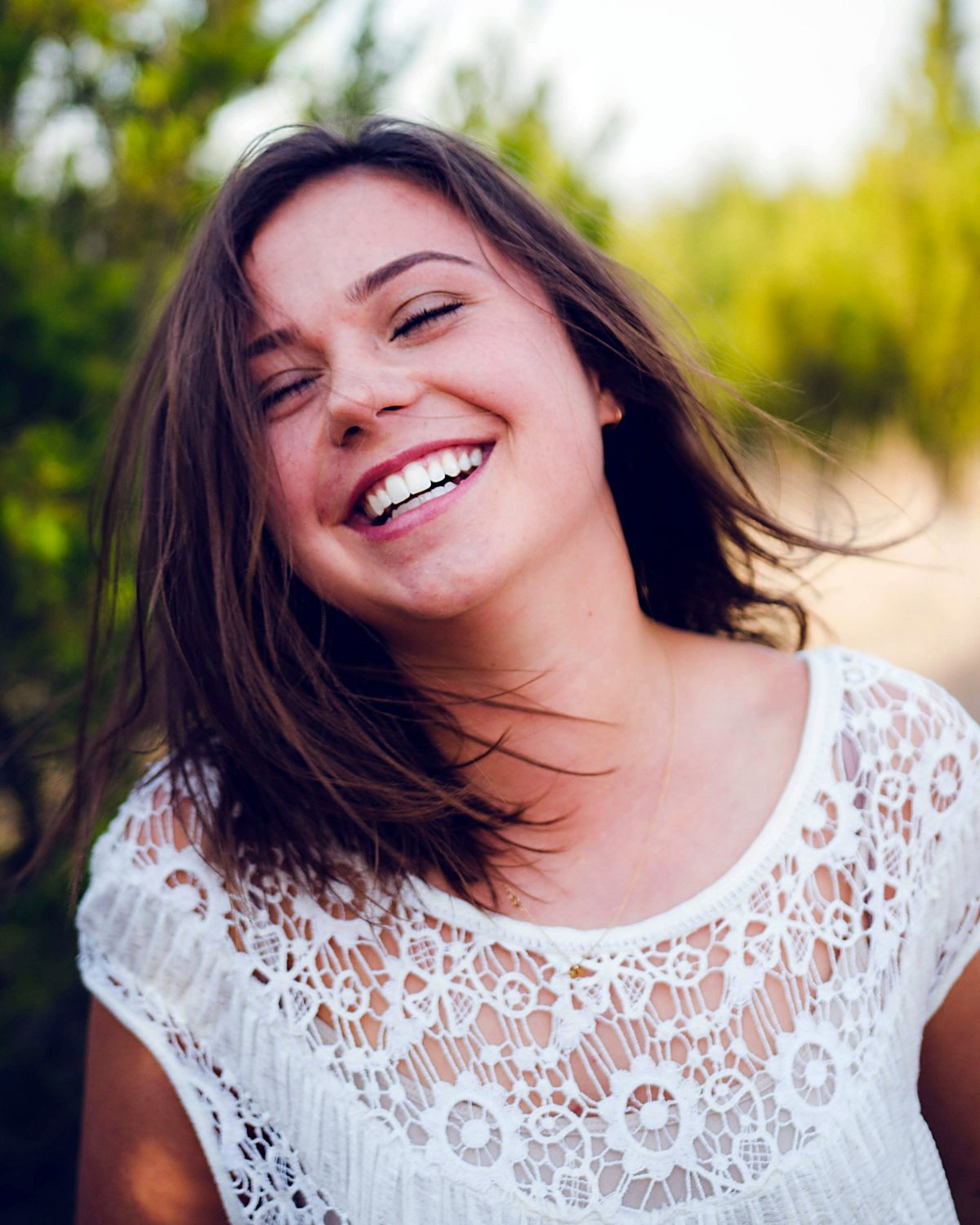 A bright, natural smile in daylight